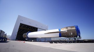 The first stage of Blue Origin's New Glenn rocket, which launched NASA&rsquo;s ESCAPADE Mars mission on Nov. 13, 2025, is rolled into a hangar at Cape Canaveral Space Force Station for inspection and refurbishment. Blue Origin CEO Dave Limp posted this photo on X on Nov. 20, 2025.