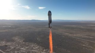 A rocket flies into space.